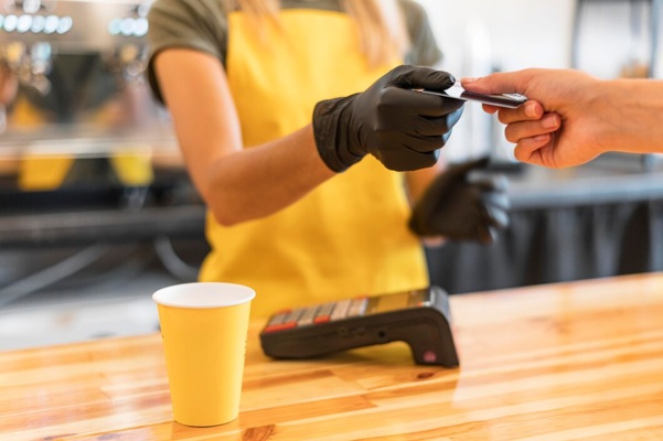 close-up-barista-with-protection-globes_23-2148630776.jpg