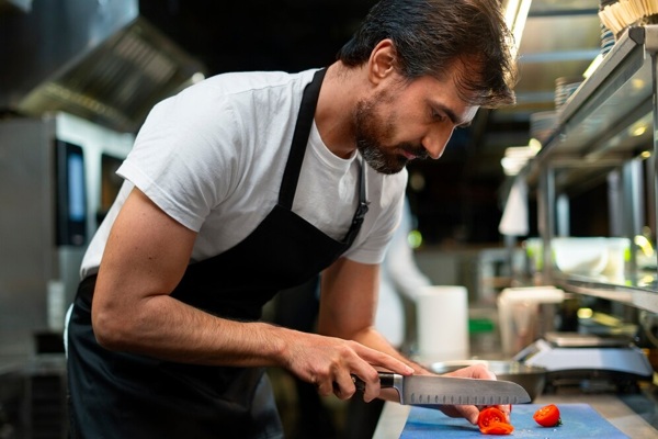 chef-cooking-kitchen-while-wearing-professional-attire_23-2151208272.jpg