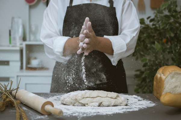 male-baker-prepares-bread-with-flour_1150-17807.jpg