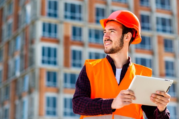 medium-shot-portrait-construction-engineer-holding-tablet_23-2148233711.jpg