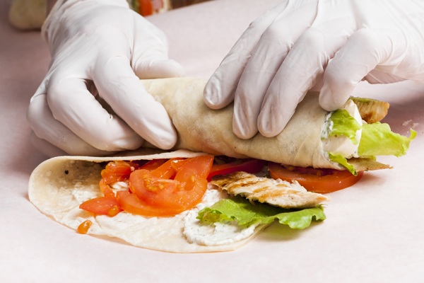 hands-preparing-burrito.jpg