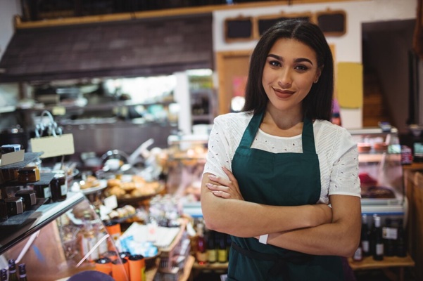 female-staff-standing-with-arms-crossed-super-market_107420-63706.jpg