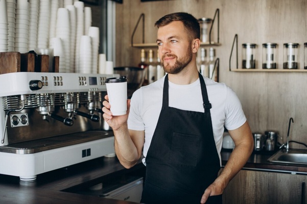 male-barista-holding-coffee-cardboard-cup_1303-29325.jpg