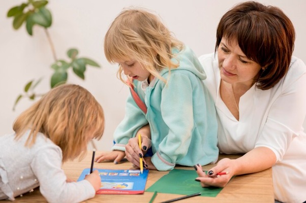 grandmother-granddaughters-playing-together_23-2148548129.jpg