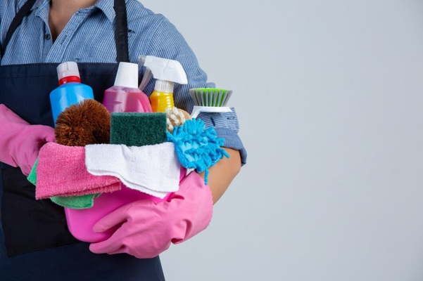 woman-is-holding-cleaning-product-gloves-rags-basin-white-wall_1150-21780.jpg