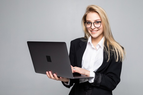 young-happy-smiling-businesswoman-holding-laptop-isolated_231208-241.jpg