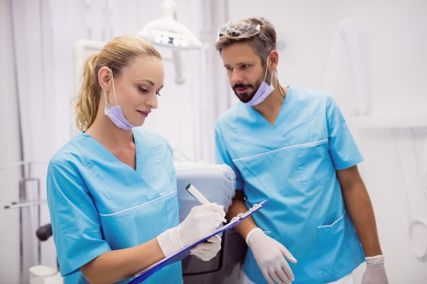 dentists-interacting-with-each-other_107420-65545.jpg