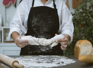 male-baker-prepares-bread-with-flour_1150-17808.jpg