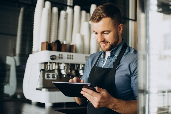 young-man-barista-coffee-shop_1303-29319.jpg