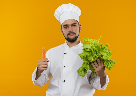 young-male-cook-chef-uniform-holding-lettuce-carrot-looking-isolated-orange-space.jpg