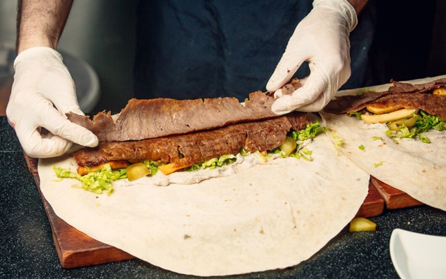 chef-preparing-lavash-doner-with-meat-vegetables_114579-3625.jpg