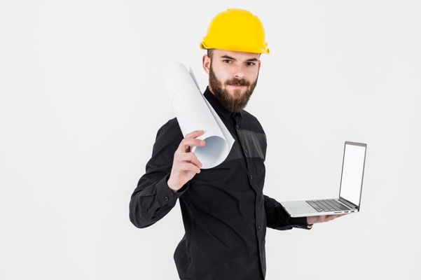 young-engineer-holding-rolledup-blueprint-open-laptop-against-white-backdrop_23-2147842971.jpg