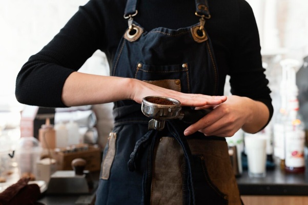 close-up-hands-preparing-coffee_23-2148892856.jpg