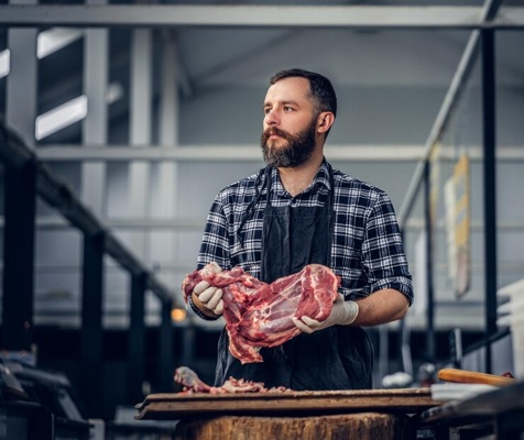 portrait-bearded-meat-man-dressed-fleece-shirt-holds-fresh-cut-meat-market_613910-16103.jpg