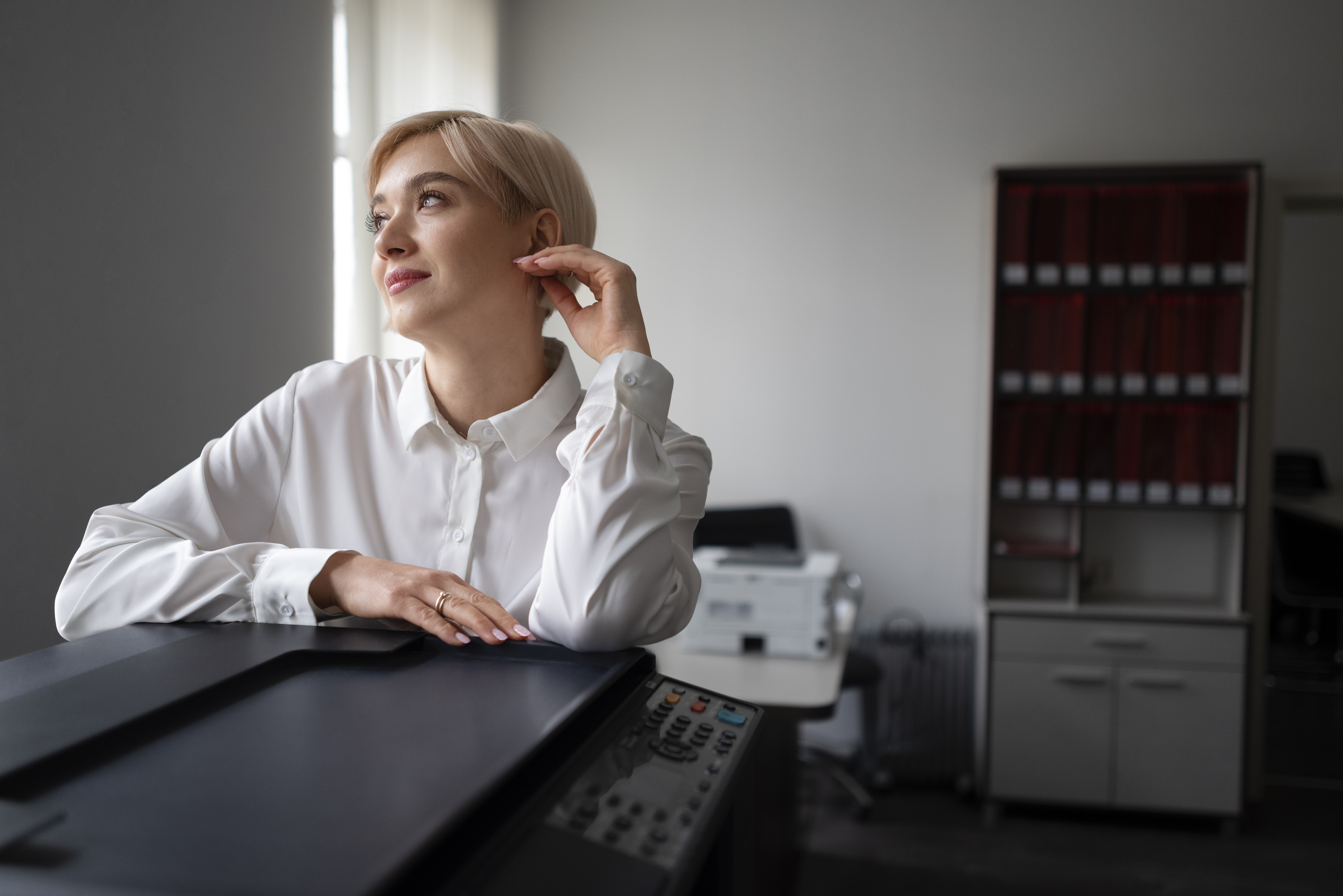 woman-using-printer-while-working-office.jpg