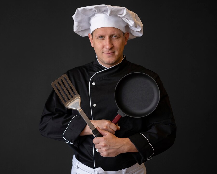 medium-shot-chef-with-pan-spatula_23-2148723241.jpg