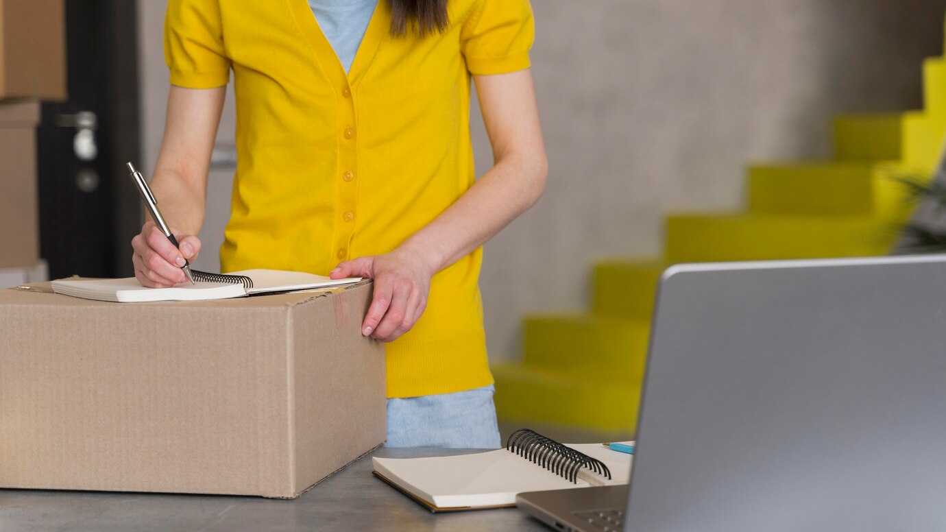 front-view-woman-preparing-box-shipment-with-laptop_23-2148567241.jpg