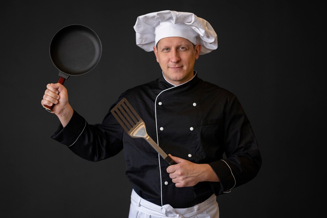 medium-shot-man-with-pan-spatula_23-2148723242.jpg