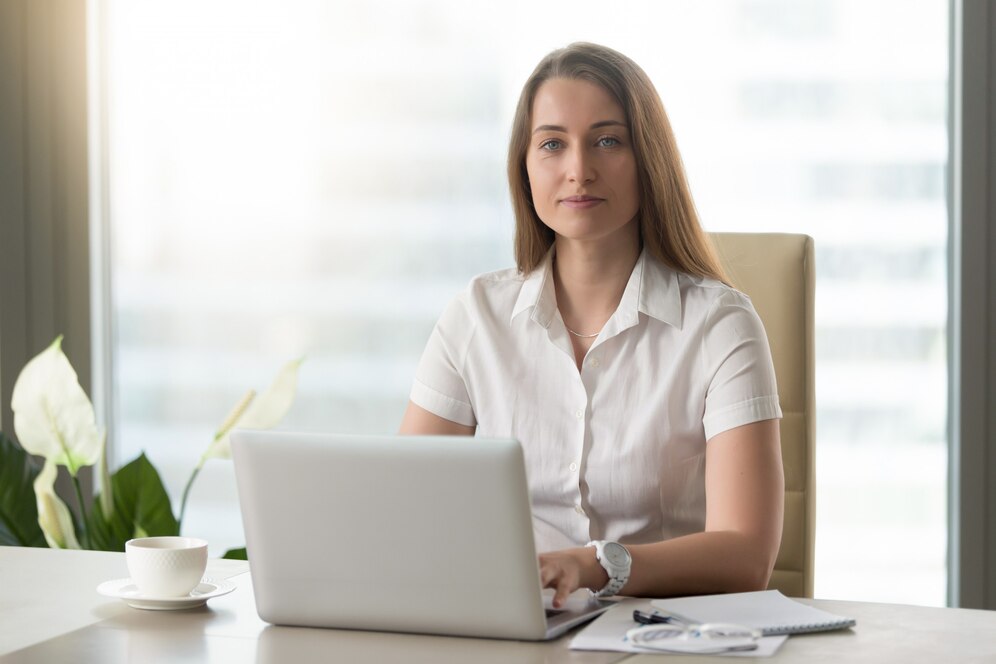 female-office-worker-doing-daily-work-laptop_1163-4252.jpg