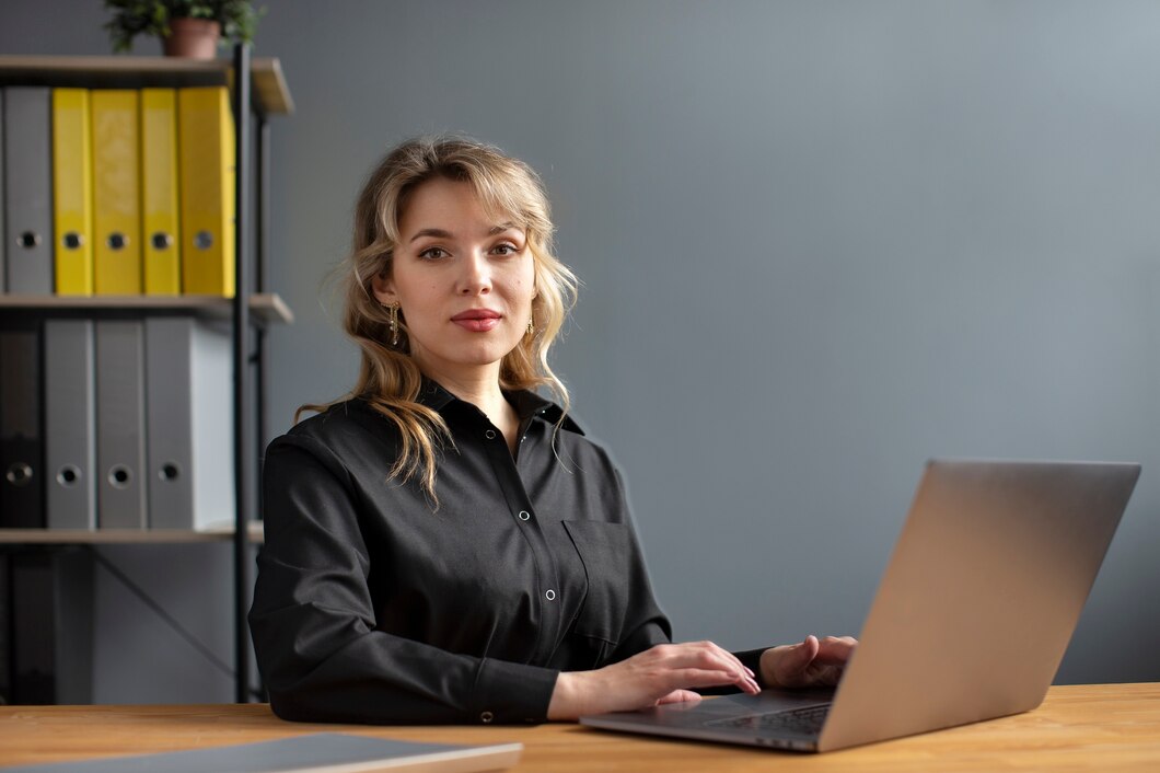 woman-working-with-laptop-side-view_23-2149915939.jpg