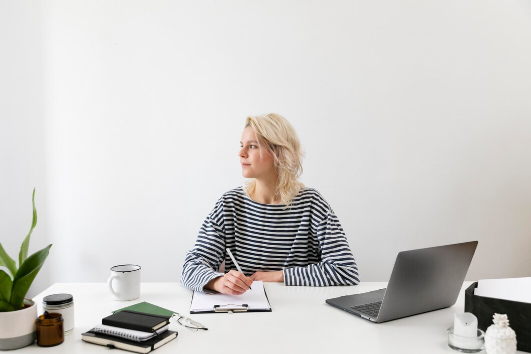 woman-with-laptop-working-from-home_23-2148916085.jpg