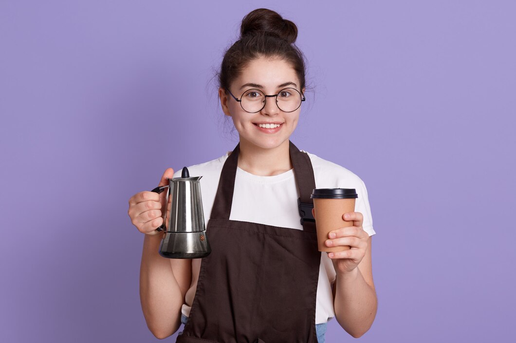 smiling-waitress-white-t-shirt-brown-apron-holding-pot-take-away-cup-hands_176532-10374.jpg