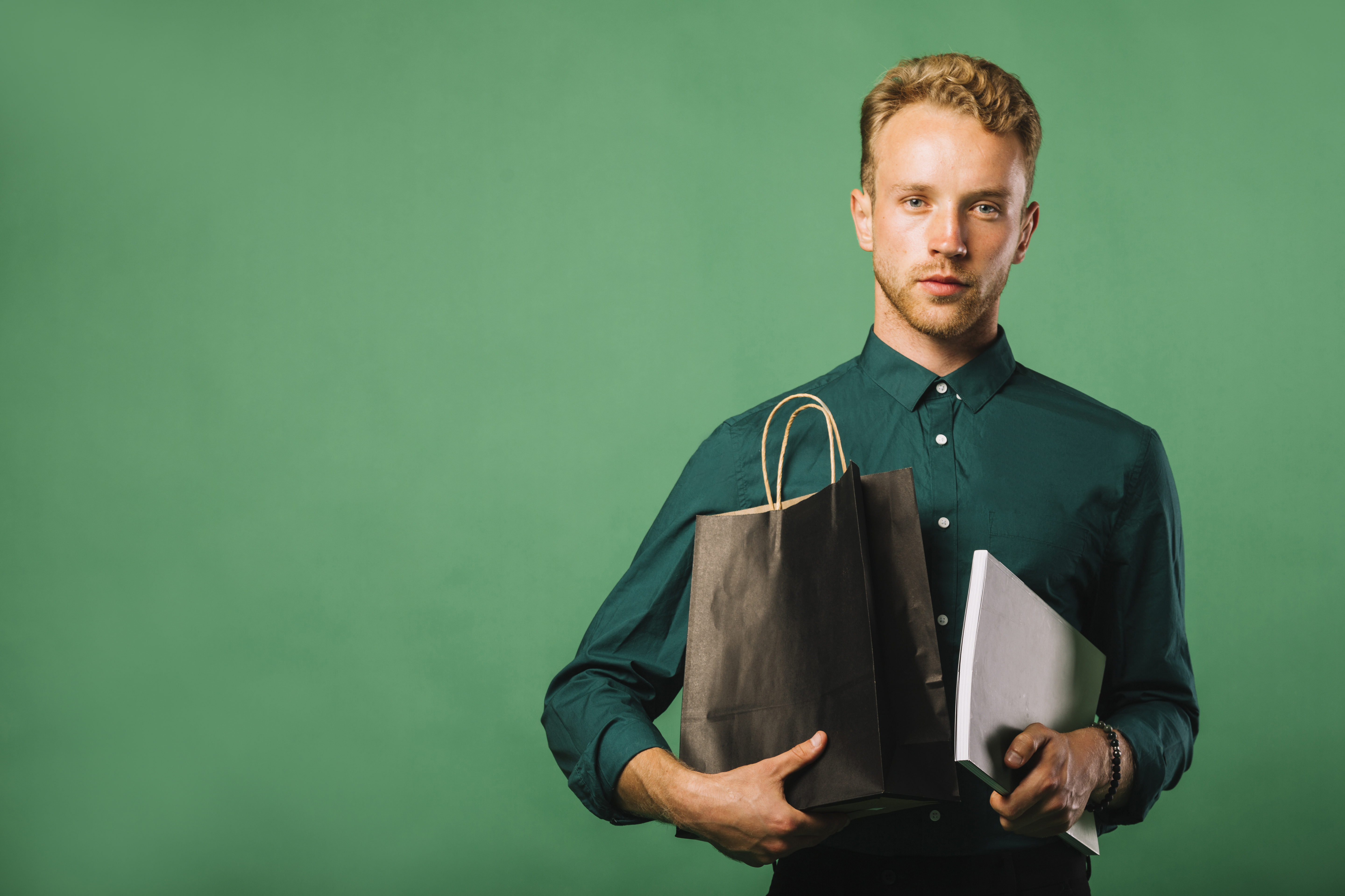 front-view-young-man-with-shopping-bags.jpg