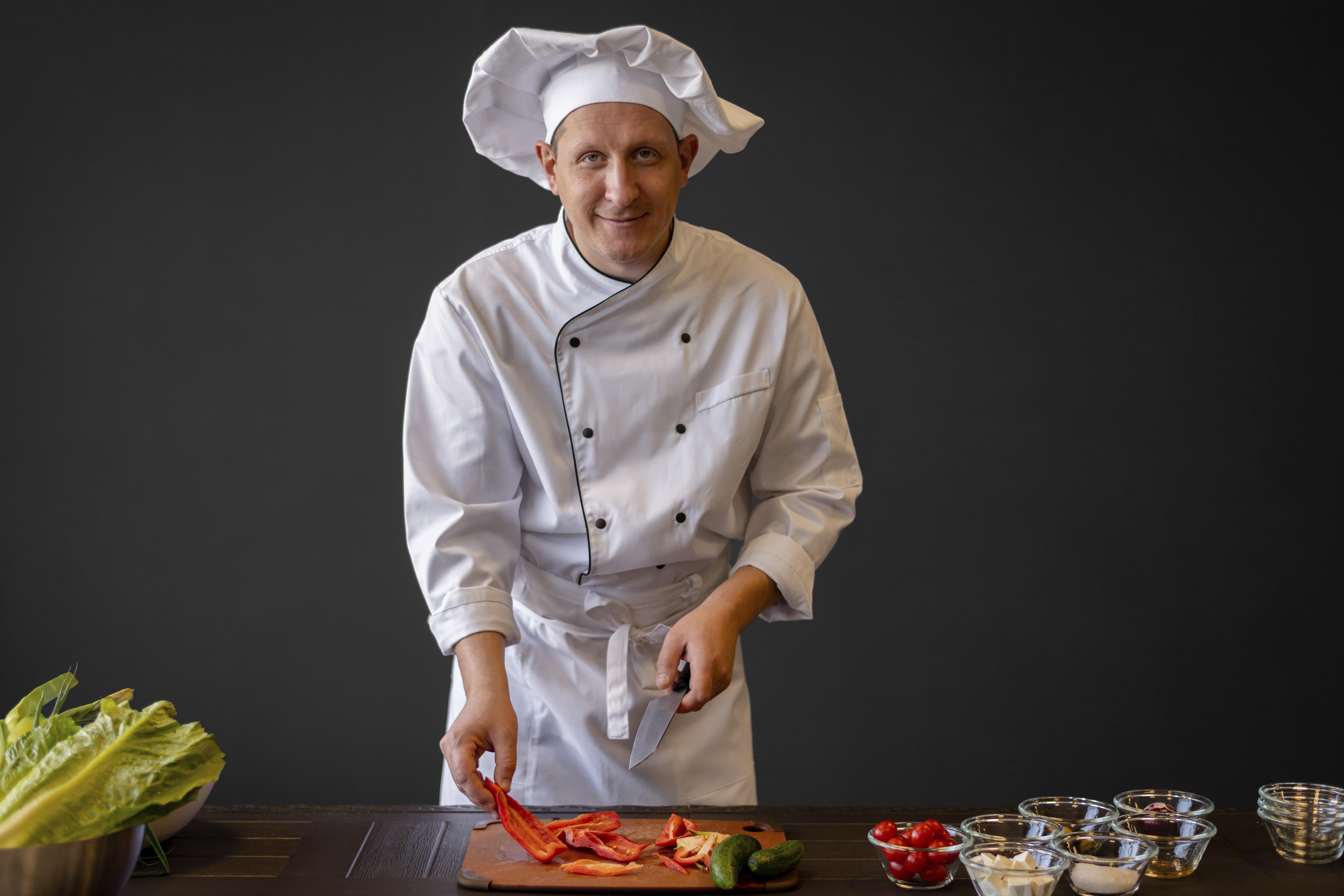 medium-shot-chef-cutting-vegetables.jpg