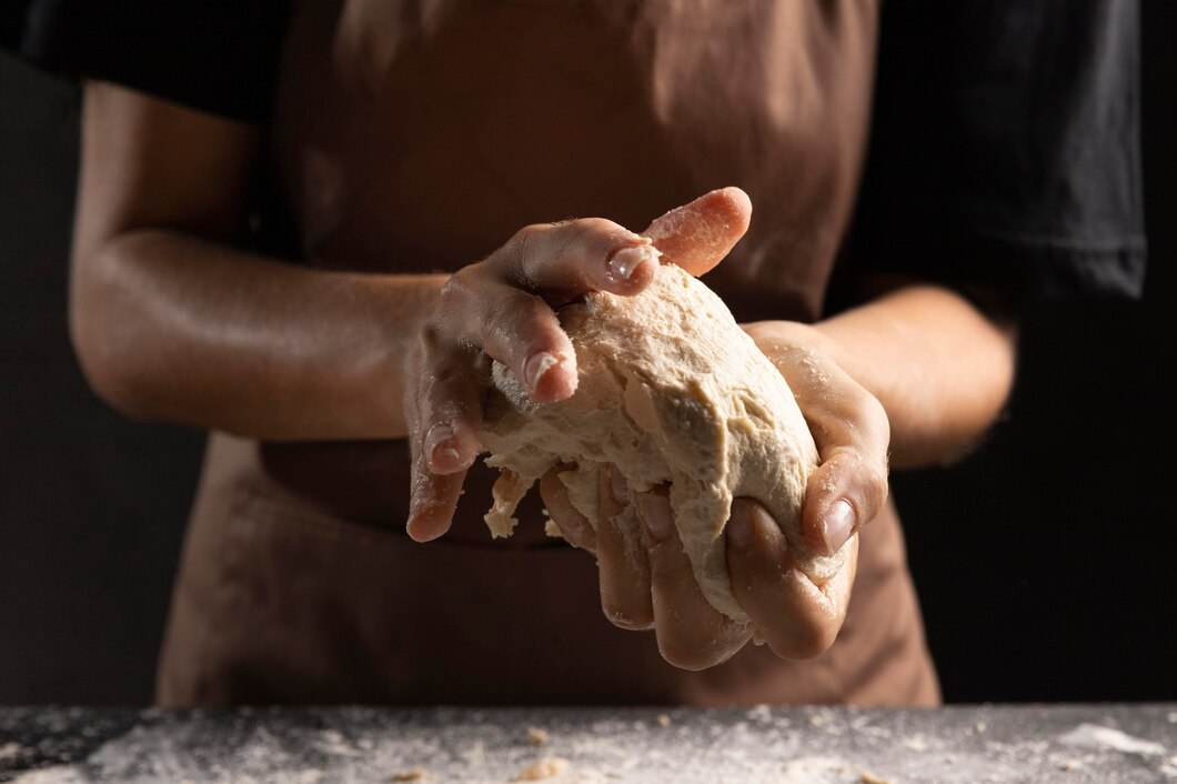 chef-kneading-bread-dough-hands_23-2148742186.jpg