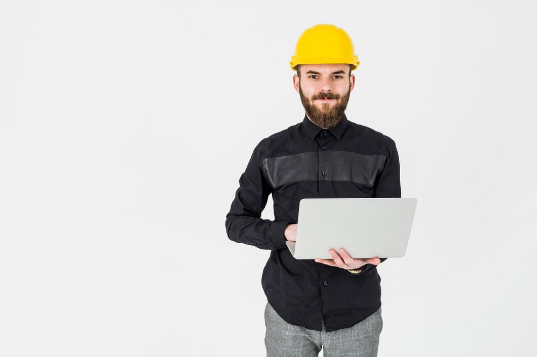 young-architect-wearing-yellow-hardhat-holding-portable-laptop_23-2147842969.jpg