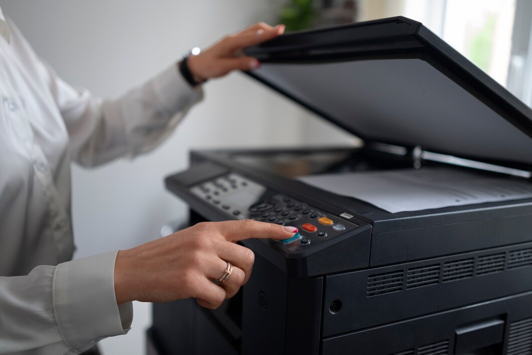 woman-work-office-using-printer_23-2149456933.jpg